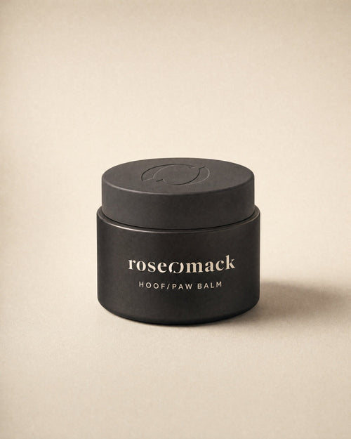 roseomack Hoof & paw balm, a squat matte black jar with the broken O pressed into its lid